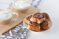 Cinnamon rolls and cup of coffe Royalty Free Stock Photo