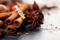 Cinnamon, staranise and cloves. winter spices on rustic table