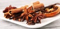 Cinnamon, staranise and cloves. winter spices on wooden table