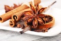 Cinnamon, staranise and cloves. winter spices on wooden table