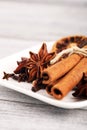 Cinnamon, staranise and cloves. winter spices on wooden table