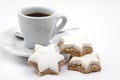 Cinnamon stars christmas cookies with cup Royalty Free Stock Photo