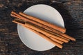 Cinnamon stick top view on wooden table background Royalty Free Stock Photo