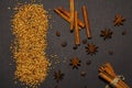 Cinnamon sticks and anise spice star, isolated on a black background close-up. View from above. Royalty Free Stock Photo
