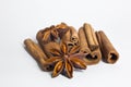 Cinnamon sticks and anise star isolated on white background close up. Royalty Free Stock Photo