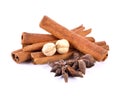 Cinnamon sticks, anise star and nutmeg isolated on white background Royalty Free Stock Photo