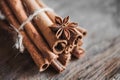 Cinnamon sticks and anise star on a wooden background. Copy, empty space for text Royalty Free Stock Photo