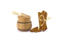 Cinnamon sticks bundle and a small wooden pot Royalty Free Stock Photo