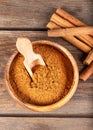 Cinnamon sticks and cinnamon powder on wood Royalty Free Stock Photo