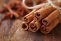 Cinnamon sticks close up on a wooden table. AI Artificial intelligence