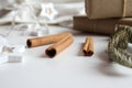 Cinnamon sticks. Happy New Year decoration on plush bedspread with New Year's Eve decoration, concept image, free