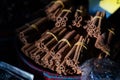 Cinnamon sticks highlighted with a sun in one of the many stalls of the Grand Bazaar of Istanbul, Turkey. Royalty Free Stock Photo