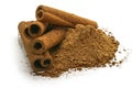 Cinnamon sticks and powder close-up view, macro photography, isolated on white background high quality details Royalty Free Stock Photo