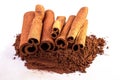 Cinnamon sticks and powder close-up view, macro photography, isolated on white background high quality details Royalty Free Stock Photo