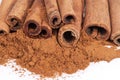 Cinnamon sticks and powder isolated on white background Royalty Free Stock Photo