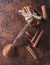 Cinnamon sticks and powder in spoon on a old copper table . Royalty Free Stock Photo