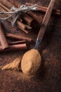 Cinnamon sticks and powder in spoon on a old copper table . Royalty Free Stock Photo