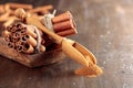 Cinnamon sticks and powder on a wooden table Royalty Free Stock Photo