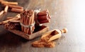 Cinnamon sticks and powder on a wooden table Royalty Free Stock Photo