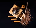 Cinnamon Sticks, Roasted Coffee Beans and Grinder Royalty Free Stock Photo