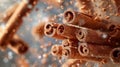 Cinnamon Sticks with small Crumbs fall on light yellow blurred background. Creative concept of floating and falling spyce. Royalty Free Stock Photo