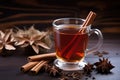 cinnamon sticks and star anise by a vanilla chai tea Royalty Free Stock Photo