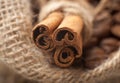 Cinnamon sticks on wooden background Royalty Free Stock Photo