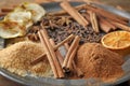 Cinnamon and sugar on plate, closeup Royalty Free Stock Photo