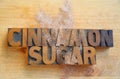 Cinnamon sugar words on cutting board Royalty Free Stock Photo