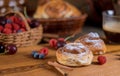 Cinnamon sweet roll buns ,berries and coffe selective focus Royalty Free Stock Photo