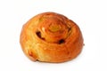 Cinnamon swirl puff roll sweetened with honey and raisins and filled with custard cream baked, selective focus of pastries Royalty Free Stock Photo