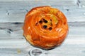 Cinnamon swirl puff roll sweetened with honey and raisins and filled with custard cream baked, selective focus of pastries Royalty Free Stock Photo