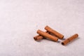 Cinnamon in tubes on a gray background2 Royalty Free Stock Photo