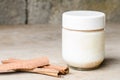 Cinnamon yogurt, rustic background. Royalty Free Stock Photo