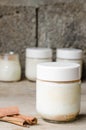 Cinnamon yogurt, rustic background. Royalty Free Stock Photo