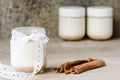 Cinnamon yogurt, rustic background. Royalty Free Stock Photo