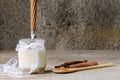 Cinnamon yogurt, rustic background. Royalty Free Stock Photo