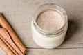 Cinnamon yogurt, rustic background. Royalty Free Stock Photo