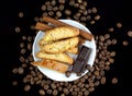 Cinnanon sticks, chocolate, bisquits and coffee Royalty Free Stock Photo