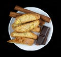 Cinnanon sticks, chocolate and bisquits Royalty Free Stock Photo