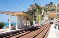 CINQUE TERRE, ITALY - APRIL 7, 2013: Train along italian coast. Royalty Free Stock Photo