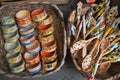 Cinque Terre, Italy - ceramic bowls and wooden spoons on baskets. Local souvenirs sold in Riomaggiore.