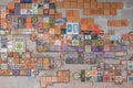 Cinque Terre, Italy - tiny colorful tiles on the wall in front of the train station in Riomaggiore, a seaside town. Royalty Free Stock Photo