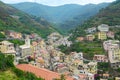 Cinque Terre, Italy - view of colorful houses, hills, vineyards of Riomaggiore, a seaside town on the Italian Riviera. Royalty Free Stock Photo