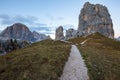 Cinque Torri rock formation under evening sun, Dolomite Alps Royalty Free Stock Photo