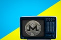 Coin xmr on the Soviet analog retro TV on blue ad yellow background