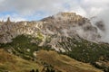 Cir in Val Gardena, South Tyrol, view from Passo Gardena in the Dolomites. Clouds covering parts of the Mountain Peak Royalty Free Stock Photo