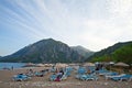 People enjoying on sun loungers on a Cirali Beach Royalty Free Stock Photo