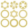 Circle boarders with golden greek meander pattern and floral motifs Royalty Free Stock Photo