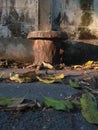 Circle cement chair beside of wall Royalty Free Stock Photo